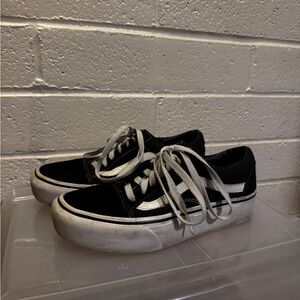 Vans Black and White Low-Top Canvas Sneakers